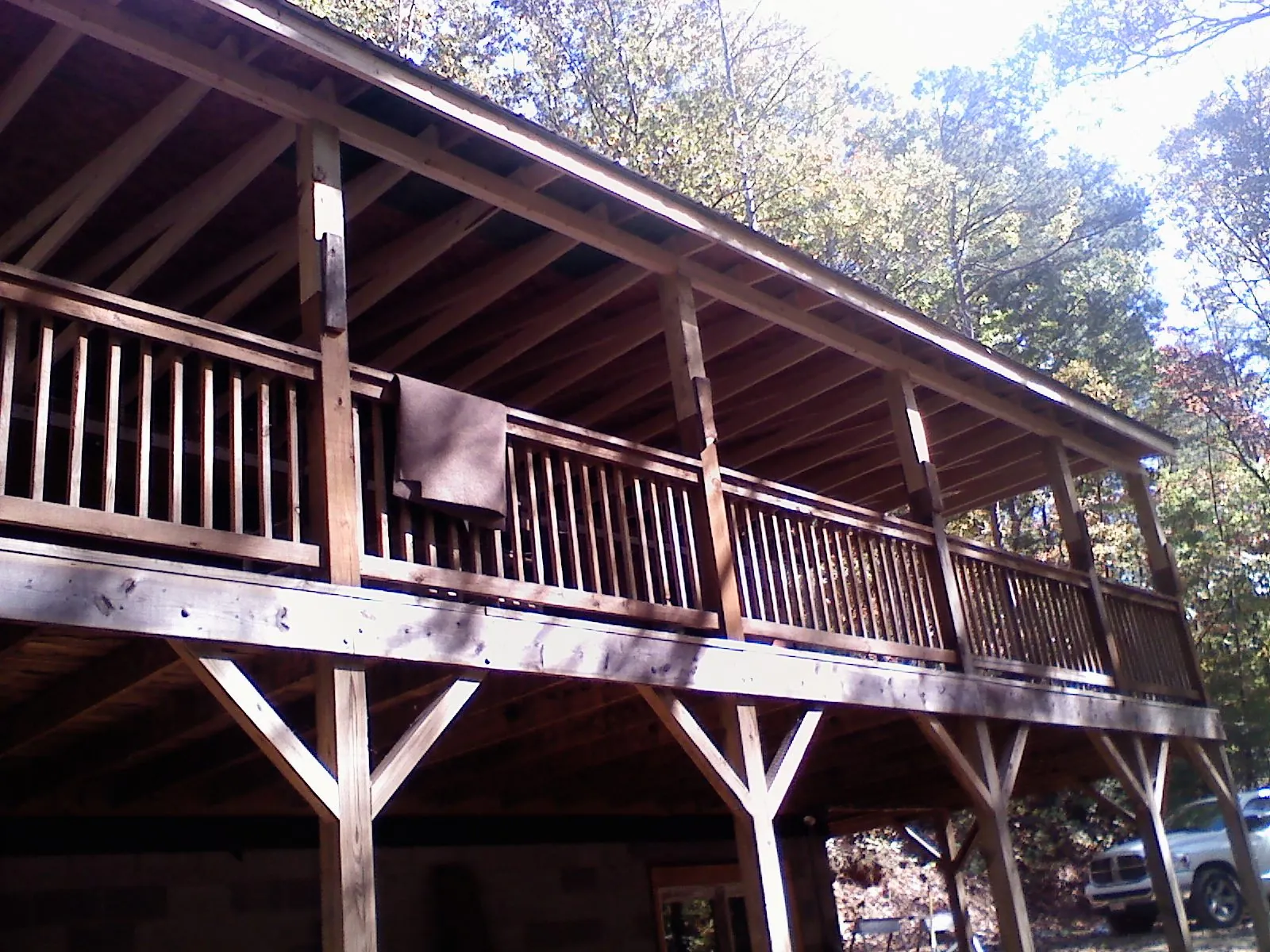 Timber framing under a new elevated porch and deck — Roof Leak Repair in Harrison Township by Roofing Brothers